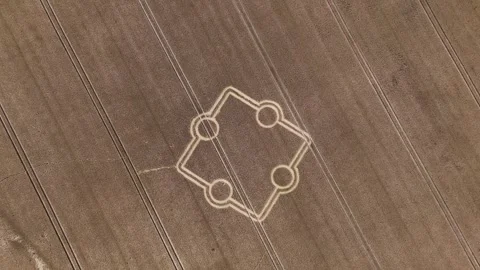 Mysterious symmetric pattern in wheat field, crop circle in Wiltshire, Stock Footage 282181917