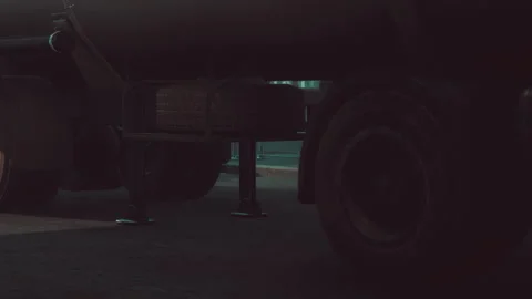 Mysterious Truck Casting Shadows on a Quiet Street at Dusk Stock Footage 344546479