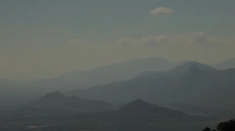 Mysterious view from the mountain among the mountains in the haze. Stock Footage 44399962