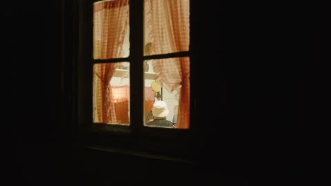Mysterious view from the window of a house where a family is eating, in France Stock Footage 286710728