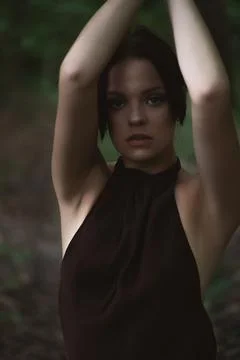Mysterious Woman in Forest Setting Stock Photos