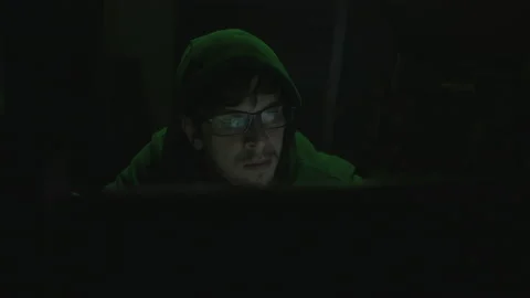 The Mysterious World of Hacking, Young Programmer in Hoodie and Black Glass.. Stock-Footage 234098721
