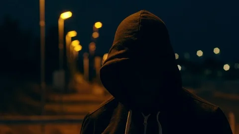 mysterious hooded man