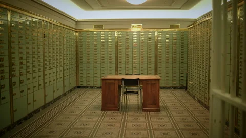 Mystery video plot set in a room filled with lockers and a desk, creating 스톡 동영상 275196710