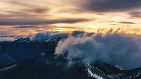 Mystic clouds sky motion fast over alps mountains nature in spring evening at Stock Footage 241448196