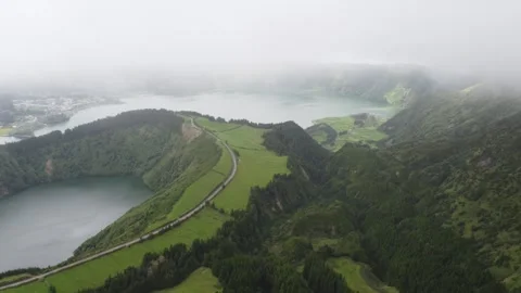 Mystic drone flight over Lagoa Azul lake in fog, Sao Miguel, Azores Stock Footage 340165259
