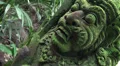 Mystic mossy Demon sculpture in tropic jungle HD Footage