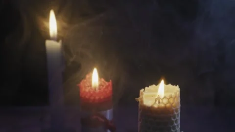 Mystical Burning Candles with Flickering Flames and Swirling Smoke Stock Footage 326628576