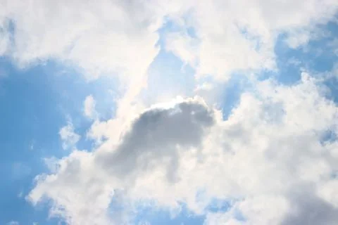 Mystical clouds in the blue sky. Stock Photos