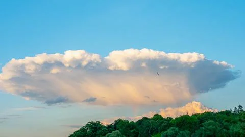 Mystical clouds, clouds in the form of an alien plate, beautiful sky Stock Photos