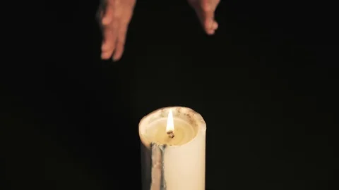 Mystical divination on a black background. A fortune teller reads the future in Stock Footage 124979455