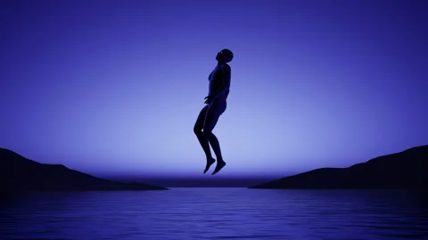 Mystical Floating Figure in a Deep Blue Dreamscape 库存影片 312782092