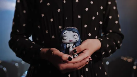 Mystical Gothic Doll Held in Female Hands for Magic Ritual or Witchcraft Concept Video stock 337882513