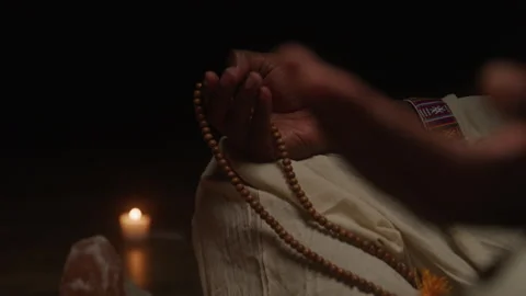 Mystical Man Using Meditation Beads In Temple Stock Footage 217768886
