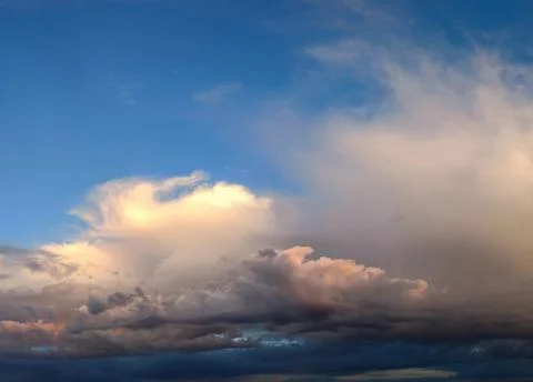 Mystical multicolored clouds at dawn Stock Photos