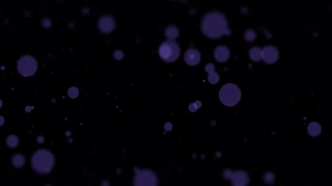 A Mystical Purple Bokeh Effect Set Against a Black Background Stock Footage 299914587