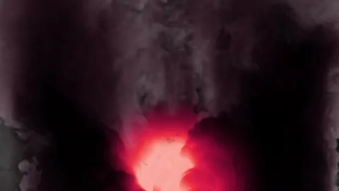 Mystical Red Light Vertical Movement and Smoke Turbulence Seamless Loop Stock Footage 259211681