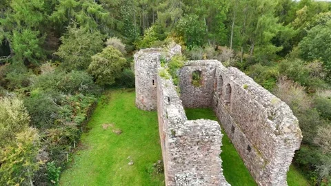 Mystical Ruins of Rait Castle Surrounded by Highlands Greenery Stock Footage 330666187
