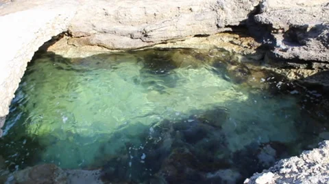 Mystical - Sea pool With waves moving in and out with bridge Video stock 34256209