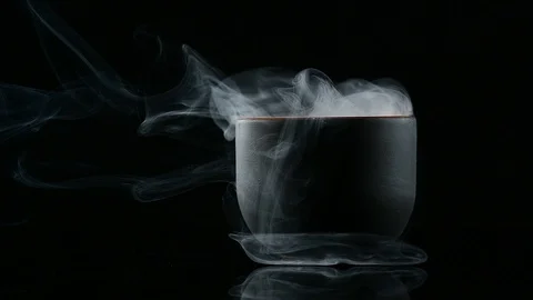 Mystical smoke from cups on a black background Stock Footage