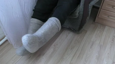 N elderly man in felt boots Stock Footage 148941441