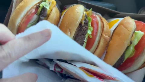In-N-Out burgers and fries; Drive Thru; | Stock Video | Pond5