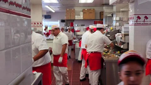 In-N-Out Employees Working Hard in Busy Kitchen Stock Footage 296570473
