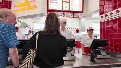 In-N-Out In N Out burger fast food restaurant. Customers interior. Stock Footage 277613142
