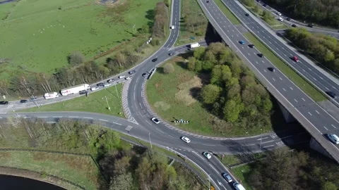 N to S sliding pan of M65 motorway junction 8 Altham, Lancashire 10-04-26 Stock Footage 332716731