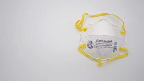 N95 Mask help to protect dust and other particle, put on white background, Stock Photos