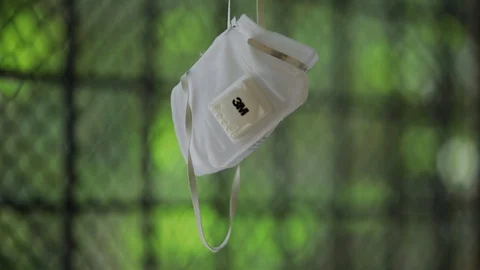 N95-mask-washed-hung-dry Stock Footage 129649792