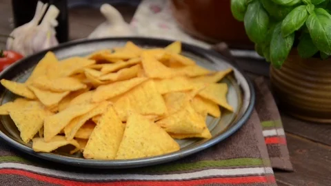 Nachos chips with cheese dip footage Stock Footage 77146090