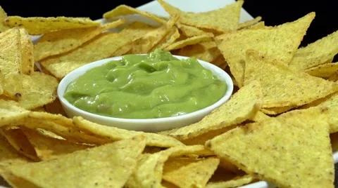 Nachos with Guacamole (seamless loopable) Stock Footage 54526120
