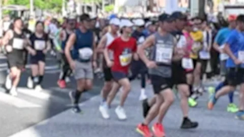 NAHA Marathon Start: Crowds of Runners Under the Okinawan Sky Stock Footage 298789330