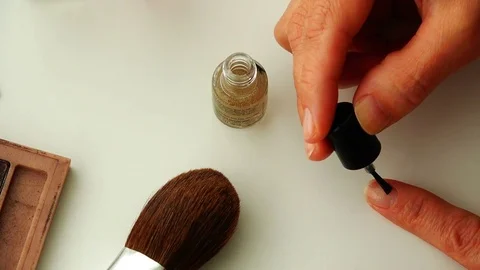 Nail brush causes the layer of varnish on the nail Stock Footage 81430084