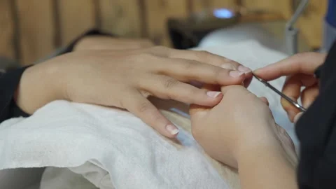 Nail care and manicure process in a salon setting Stock Footage 325442184