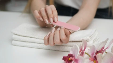 Nail care. Preparing for a manicure. A close-up plan Stock Footage 128986318