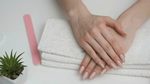 Nail care. Preparing for a manicure. A close-up plan Stock Footage 128986994