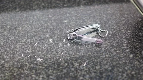 Nail clipper with nail remain, pan shot Stock Footage 129491902