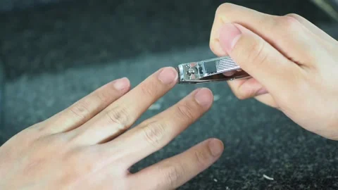 Nail clipping using the clipper close up Stock Footage 129491909