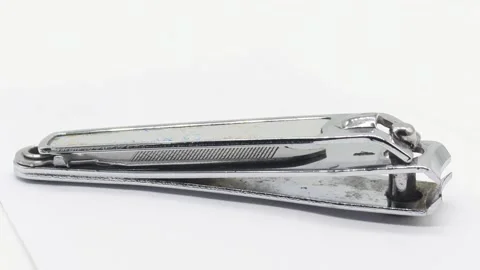Nail cutter on white background with selective focus Stock Footage 141264046
