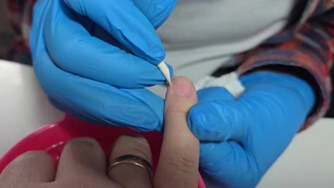 Nail extensions, manicure, nail correction, hands in the foreground gel polishes Stock-Footage 312058538