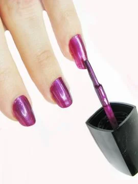 Nail lacquer making manicure Stock Photos