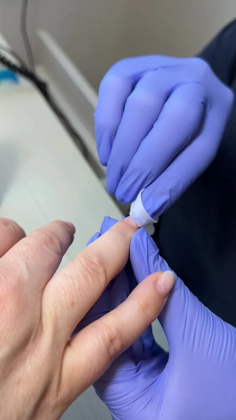 Nail master applying gel polish, step by step guide.manicurist is using a nail Stock Footage 317850188