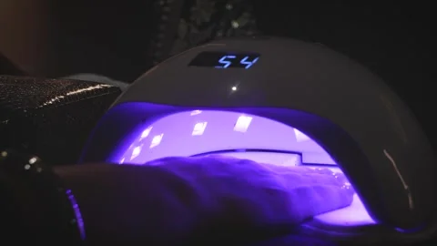 Nail Polish Drying in UV Machine at Salon Stock Footage 318769315