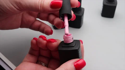 Nail polish open-up and close-up. Pink color. Stock Footage 207132069