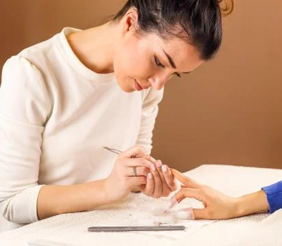 Nail polish removal process Stock Photos