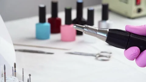 Nail procedure process in the salon, hardware manicure and pedicure Stock Footage 196223159