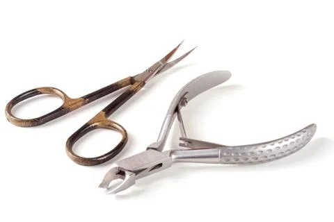 Nail scissors and clippers to remove the cuticle care products isolated on white Stock Photos