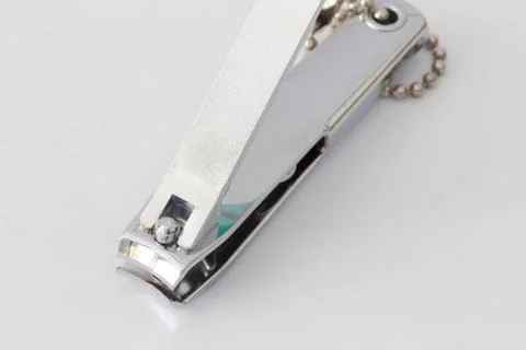 Nail scissors are placed on a white background. Stock Photos